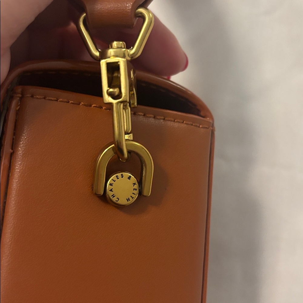 Charles & Keith Tan Brown Leather elongated Crossbody Bag magnetic closure - Picture 4 of 16